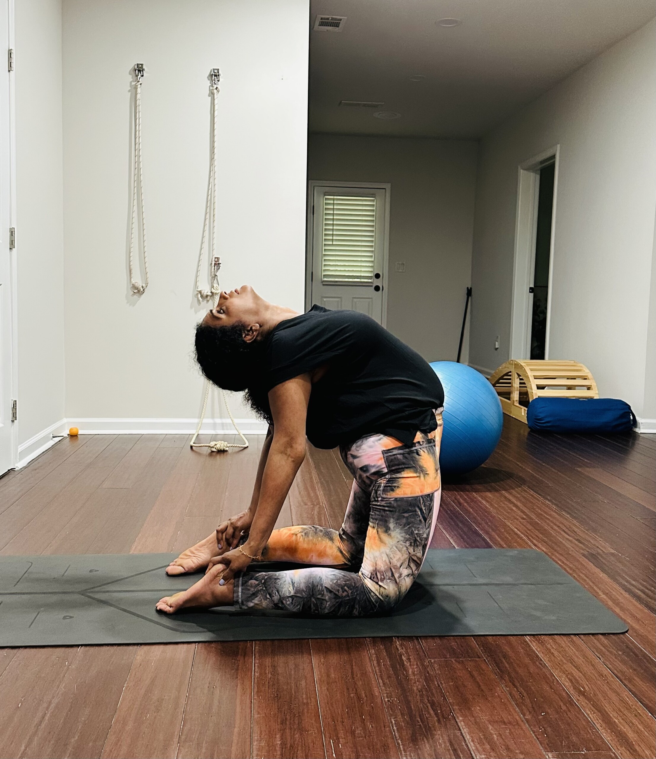 Camel pose with prop support at Brinda Yog Studio's home studio in Duluth, GA