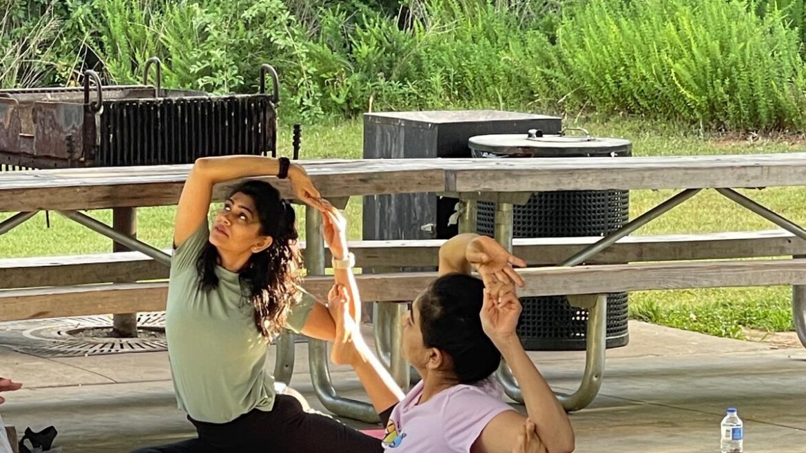 Outdoor yoga class at a park pavilion near Suwanee, GA with Brinda Yog Studio